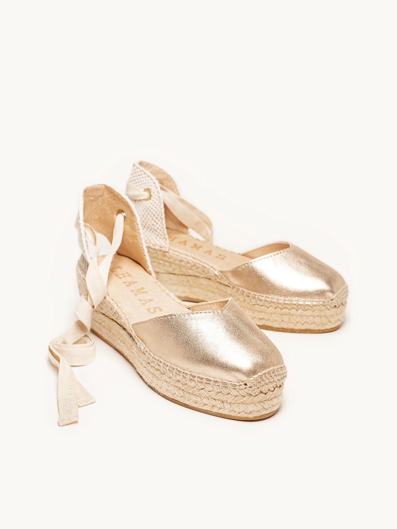 Romero Plataforma Ante Metal Oro